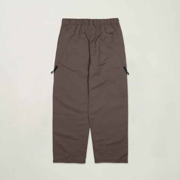 Brown pants with zippers on a light gray background