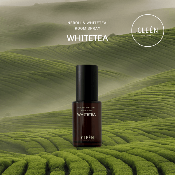 Room spray bottle labeled 'Whitetea' by Cleén with a green field background