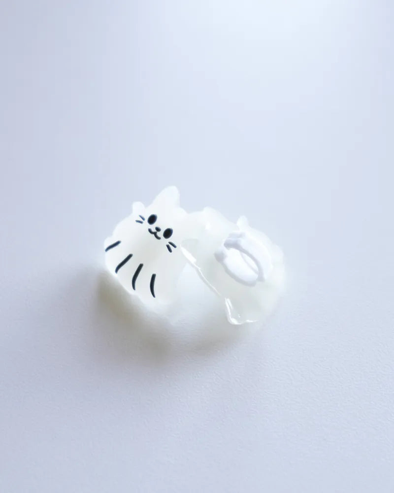White pvc with cat design on a light gray background