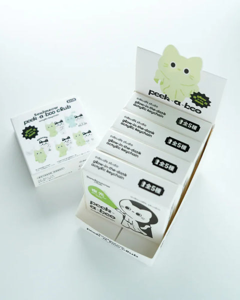 Packaging of Peek a Boo Cub with green bear design on a white background