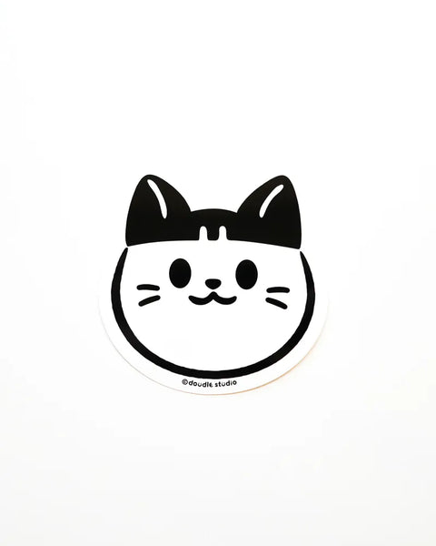 Black and white cat face design on a white background