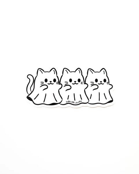 Three cartoon cats in a row on a white background