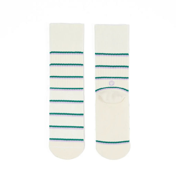 Pair of white socks with green stripes on a white background