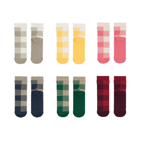 Set of colorful plaid socks arranged in a grid on a white background