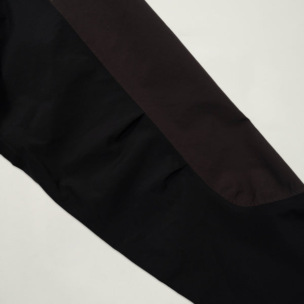 Close-up of black fabric on a light gray background