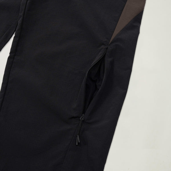 Black jacket on a light beige background