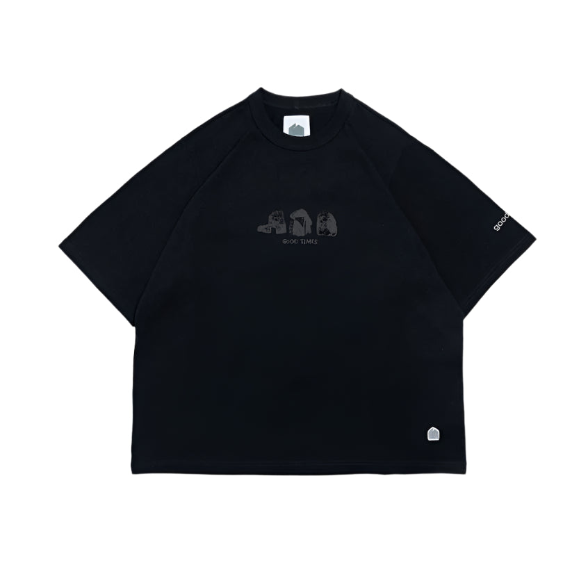 Black t-shirt with small graphic on a white background