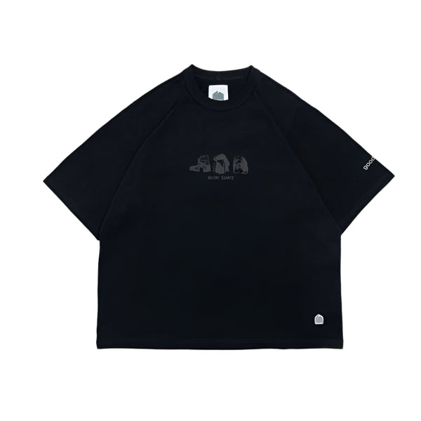 Black t-shirt with small graphic on a white background