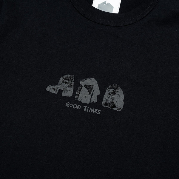 Black t-shirt with a graphic design and text on a plain background