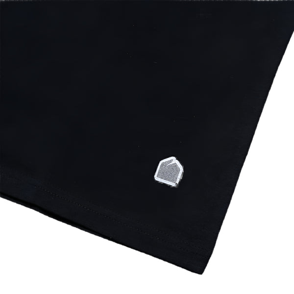 Black fabric with a small white logo on a white background
