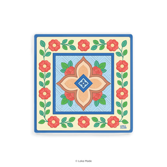 Decorative tile with floral design and geometric center on a white background