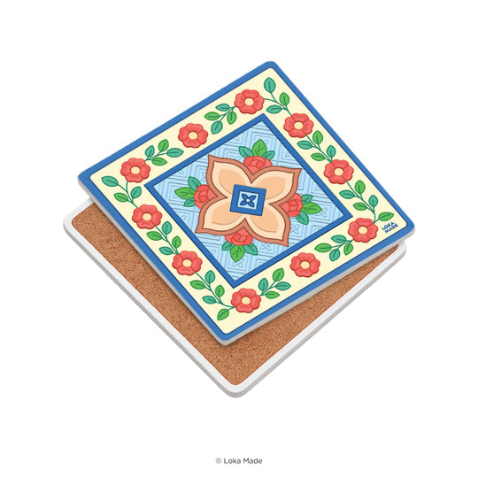 Decorative coaster with floral design on a white background