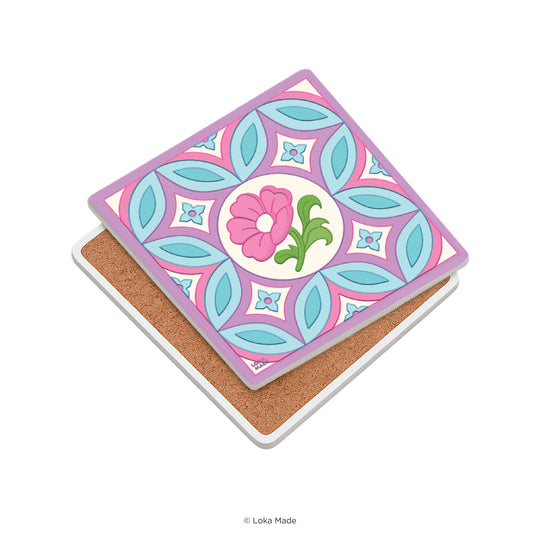Decorative coaster with floral design and pink border on a white background