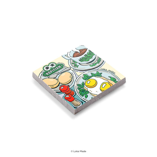 Card game box with colorful illustrations of food items on a white background