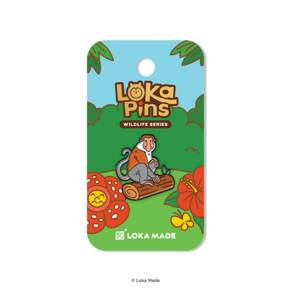 Loka Pins Wildlife Series packaging with a cartoon monkey on a log, flowers, and Loka Made branding.