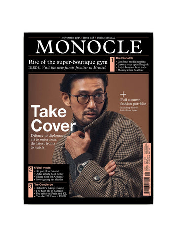 Magazine cover featuring a man in glasses and a checkered jacket with 'Monocle' branding.
