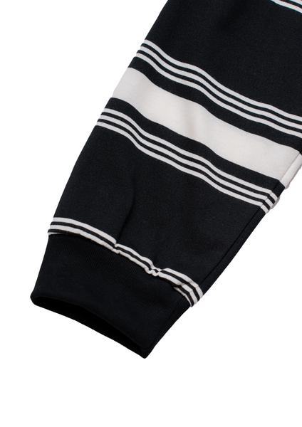 Black fabric with white stripes on a light gray background