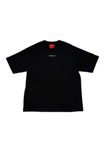 Black t-shirt with a small logo on a light gray background