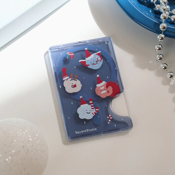 Small blue case with cartoon characters on a light surface