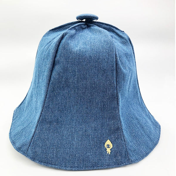 Blue denim hat with a small logo on a white background